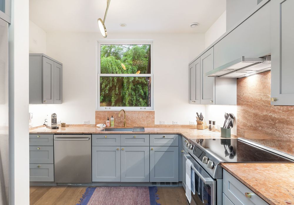 A serene kitchen that combines beauty and comfort for your cooking needs.