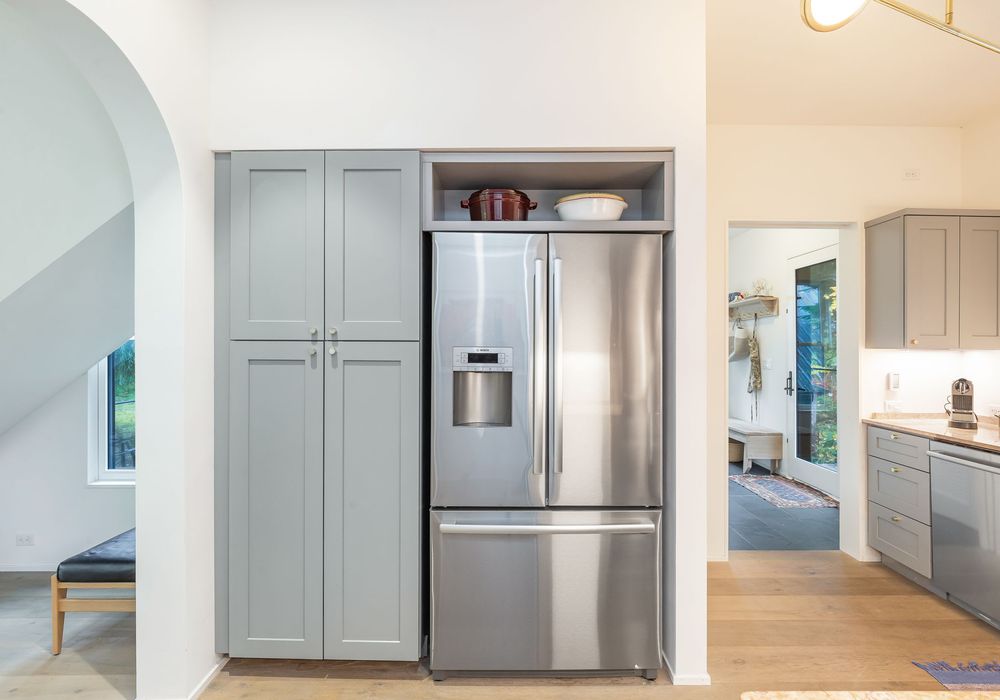 A serene kitchen that combines beauty and comfort for your cooking needs.