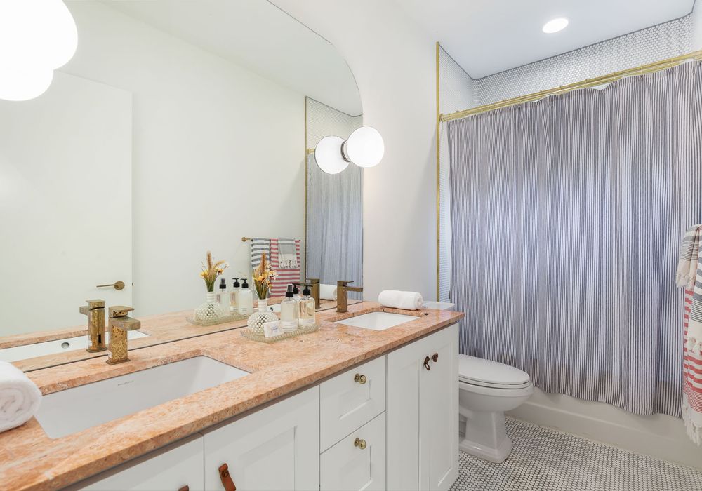Pristine and elegant, our bathroom is a calming sanctuary for all your self-care moments