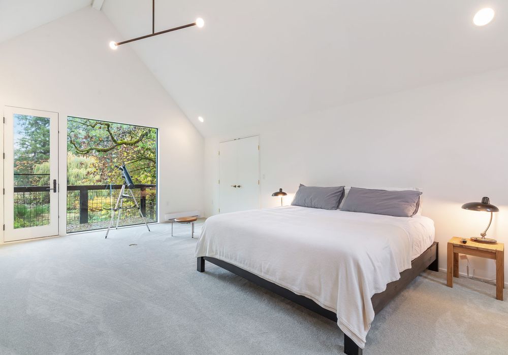 Rest and restore in these charming bedrooms, where a telescope invites you to discover the universe.