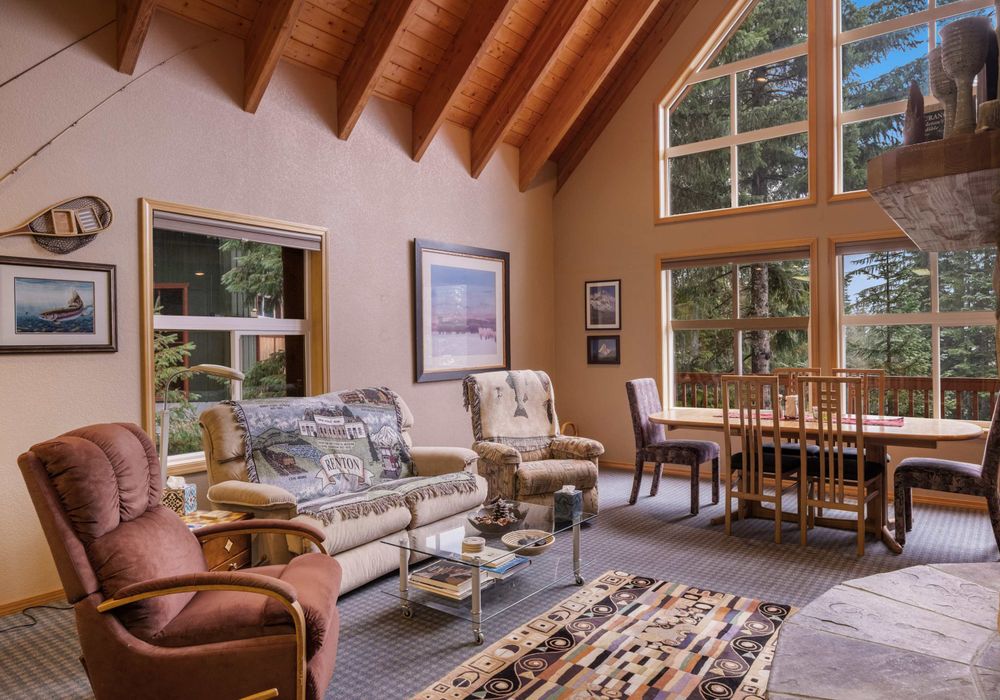 A beautifully furnished living room with cozy seating and plenty of natural light, making it the perfect spot to unwind.