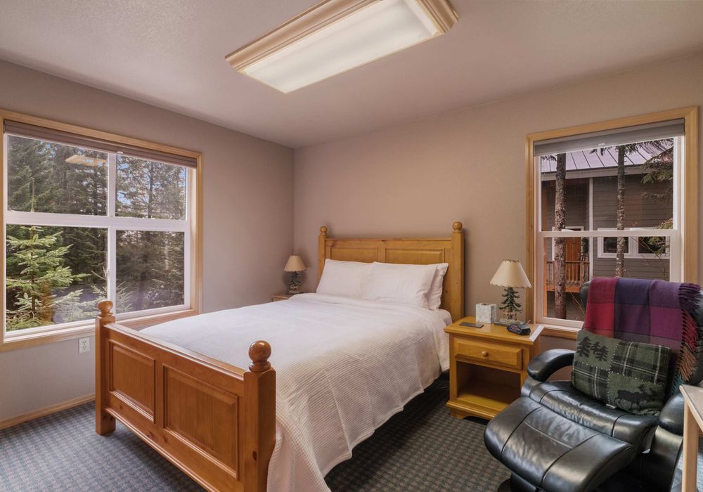 With its inviting ambiance and luxurious bedding, this bedroom is the perfect spot to curl up and recharge.