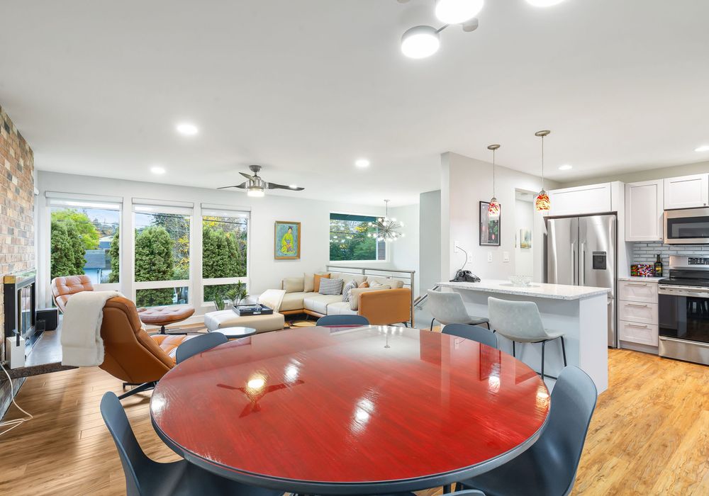 This bright dining area features a great seat that blends comfort with style, perfect for leisurely meals or family dinners.