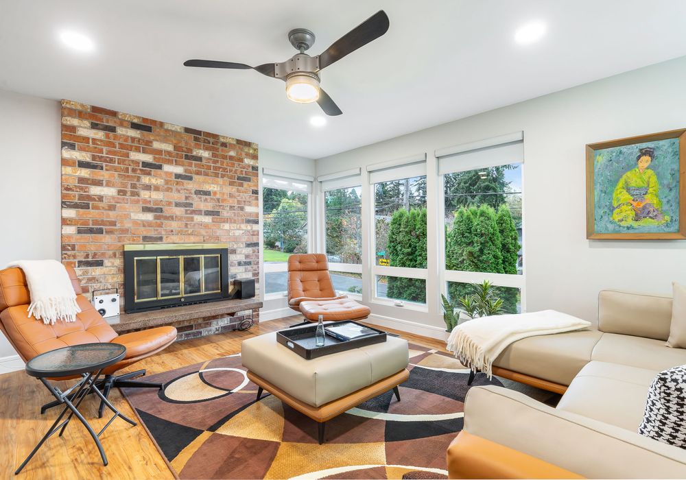 This living room features a gorgeous fireplace, providing both visual appeal and warmth.