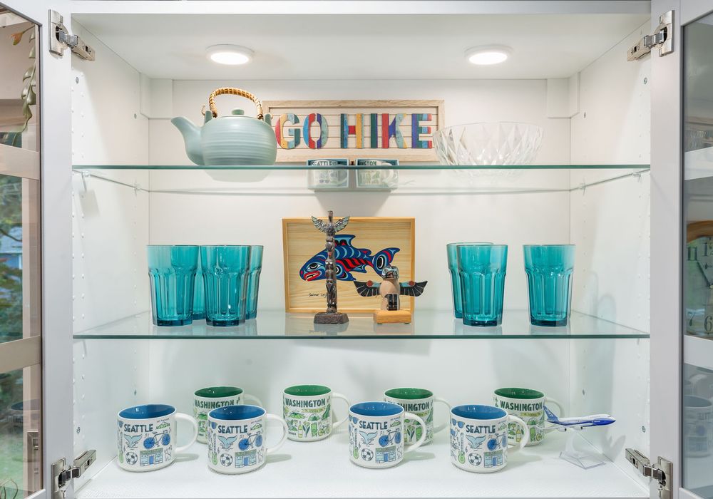 Stocked with a variety of colorful glassware, adding a fun and vibrant touch to your meals and drinks.