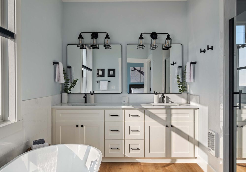 Separate shower and tub in the primary bathroom.