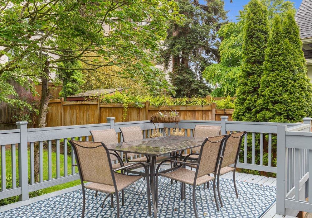 The beautiful backyard, with outdoor dining area
