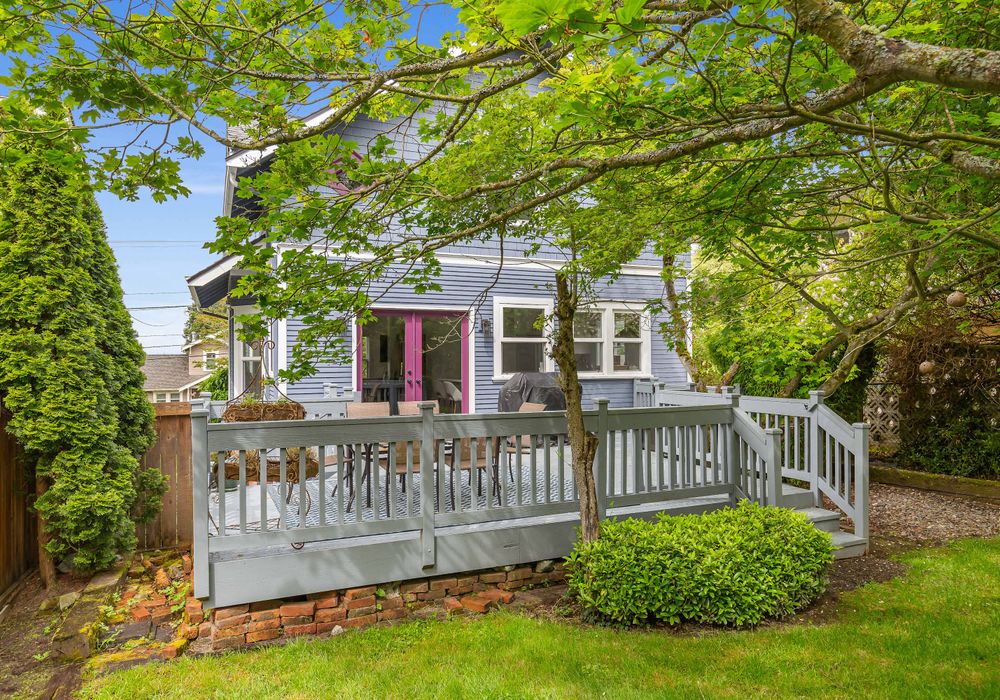 The beautiful backyard, with outdoor dining area
