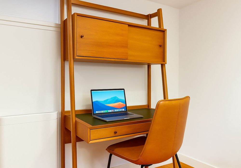 Work remotely or take a video call. Tucked-away desk with outlets and good light.