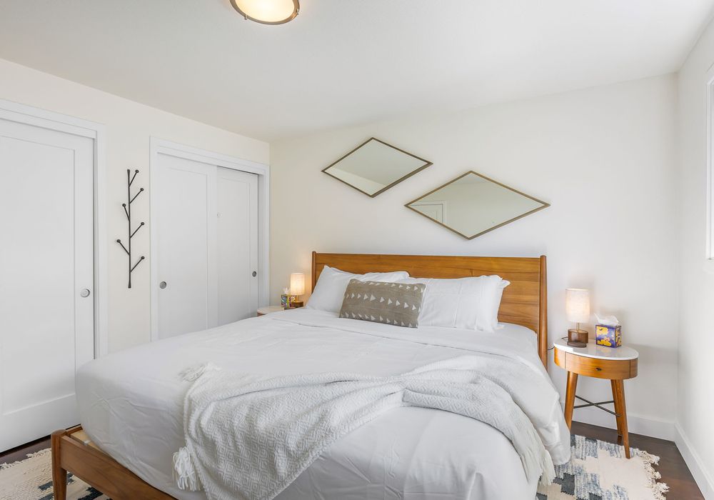 Peaceful bedroom sanctuary with soft linens and a calming ambiance.