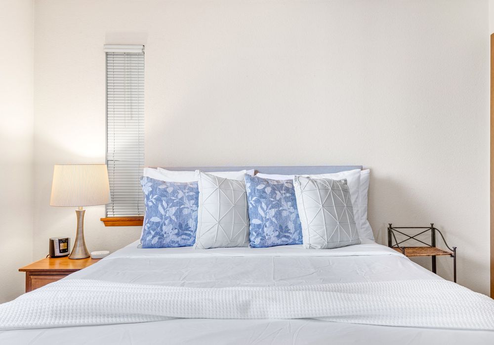 Plush bedding and serene design for the perfect night’s rest.
