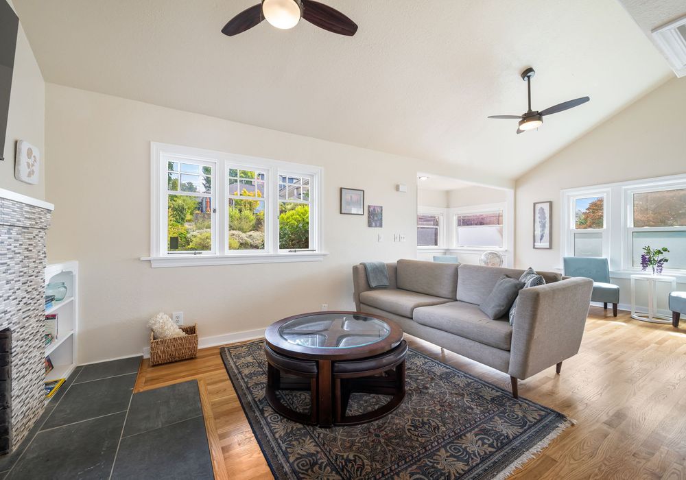 Comfortable living area with natural light and flexible seating.