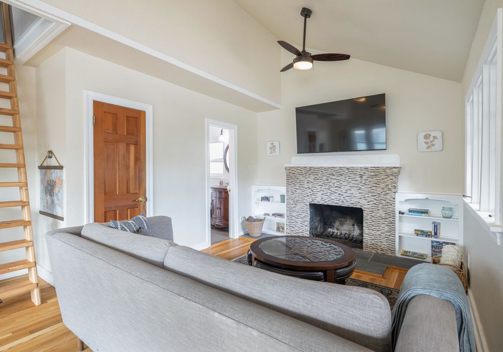 Comfortable living area with natural light and flexible seating.