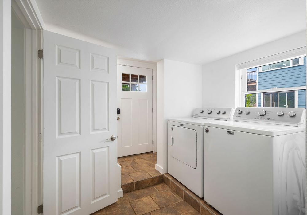 Laundry room with washer and dryer for extended stays.