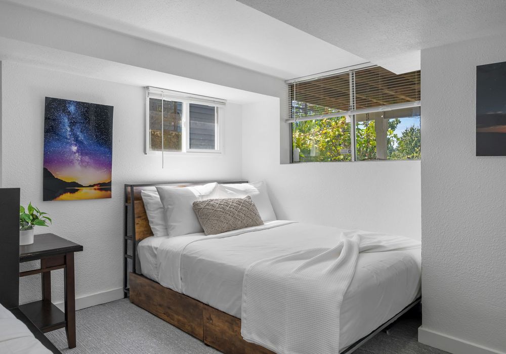 Bedroom #3, with twin and double beds.