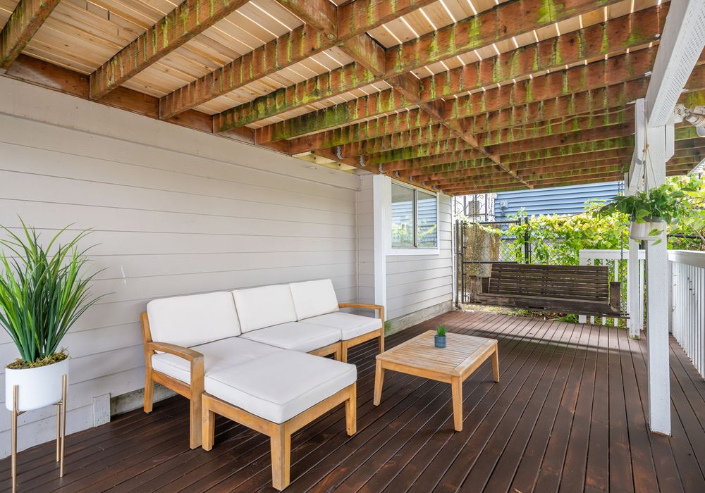 Lower deck with cushioned seating and shaded retreat.