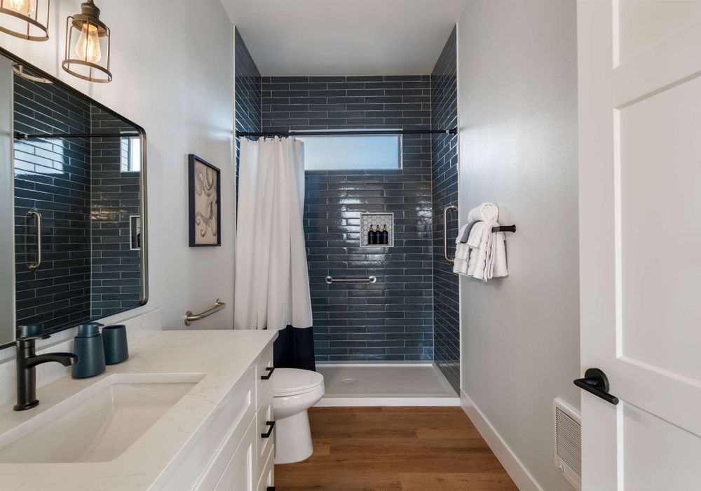 Bathroom 2 of 3 - bright, clean, and ready with essentials.