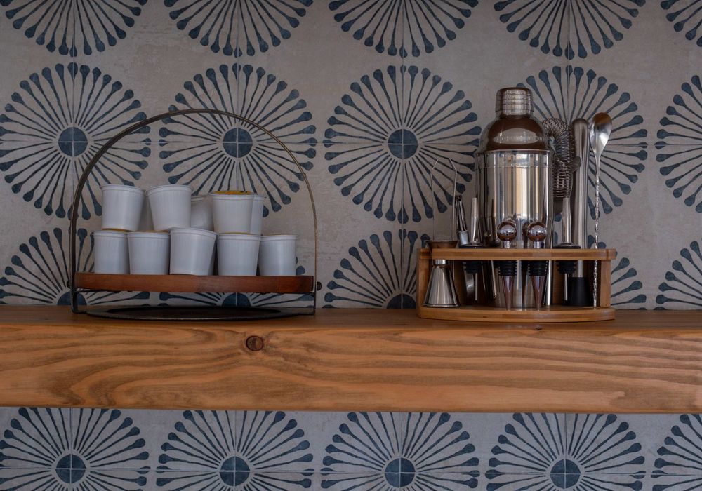 Coffee + bar tools in the fully stocked kitchen.