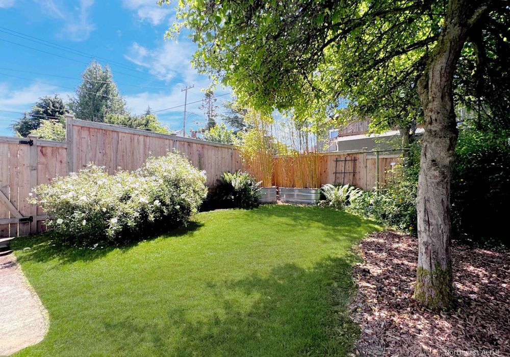 Green and private fenced yard.