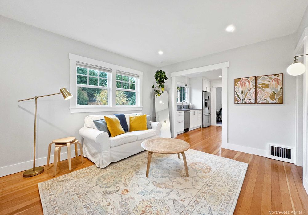 Bright and spacious living room with cozy seating.