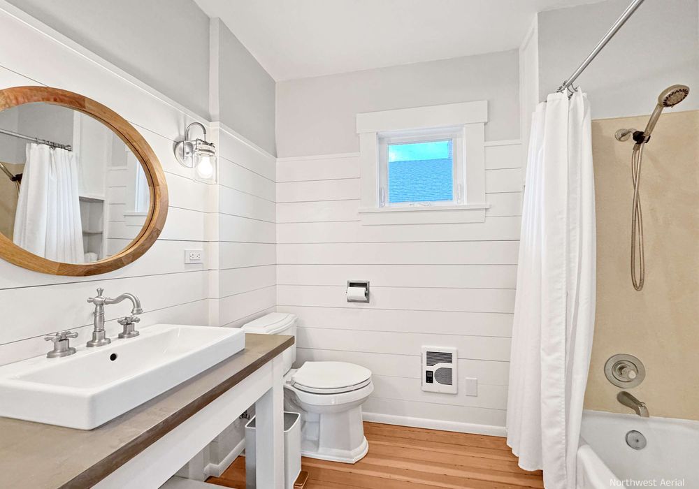 Refresh and recharge in the sparkling, well-appointed bathroom.