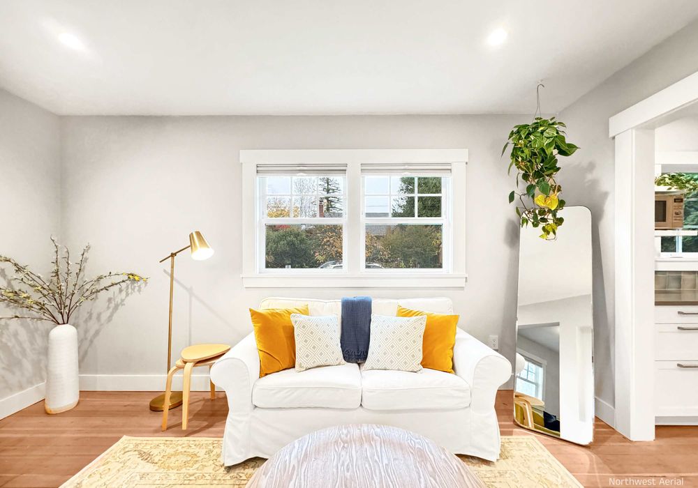 Bright and spacious living room with cozy seating.