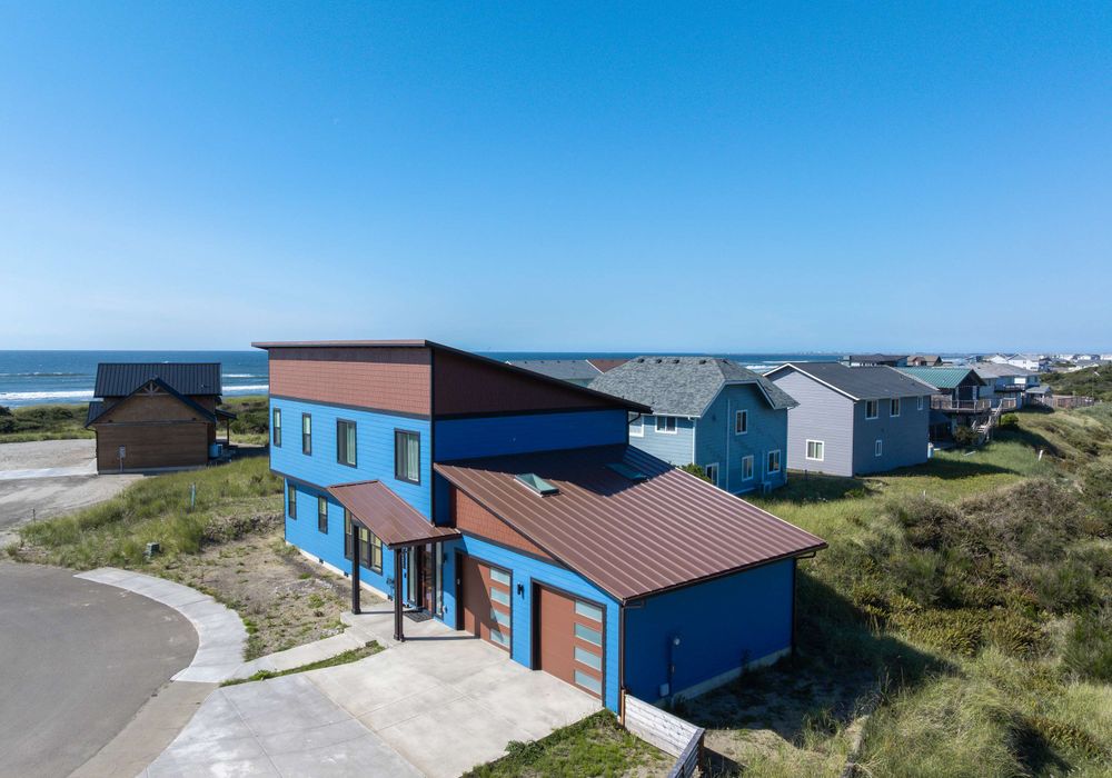 Welcome to our modern beach house with clean lines and just steps to the beach.