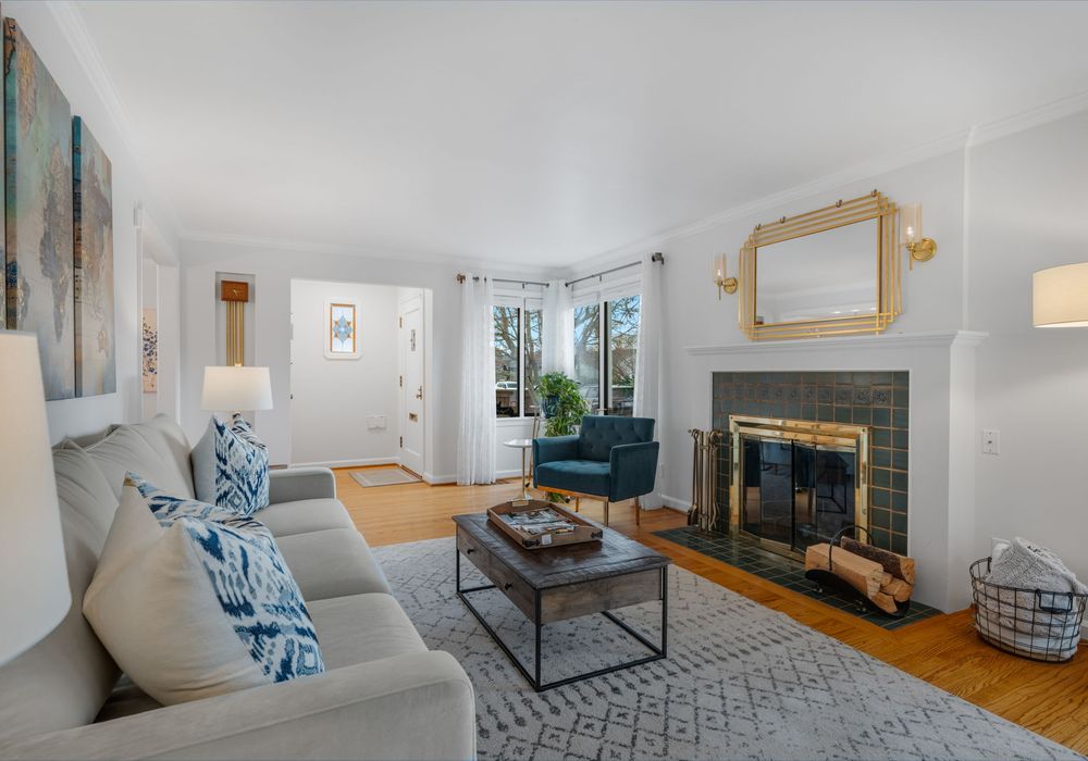 Bright and spacious living room with cozy, stylish seating.