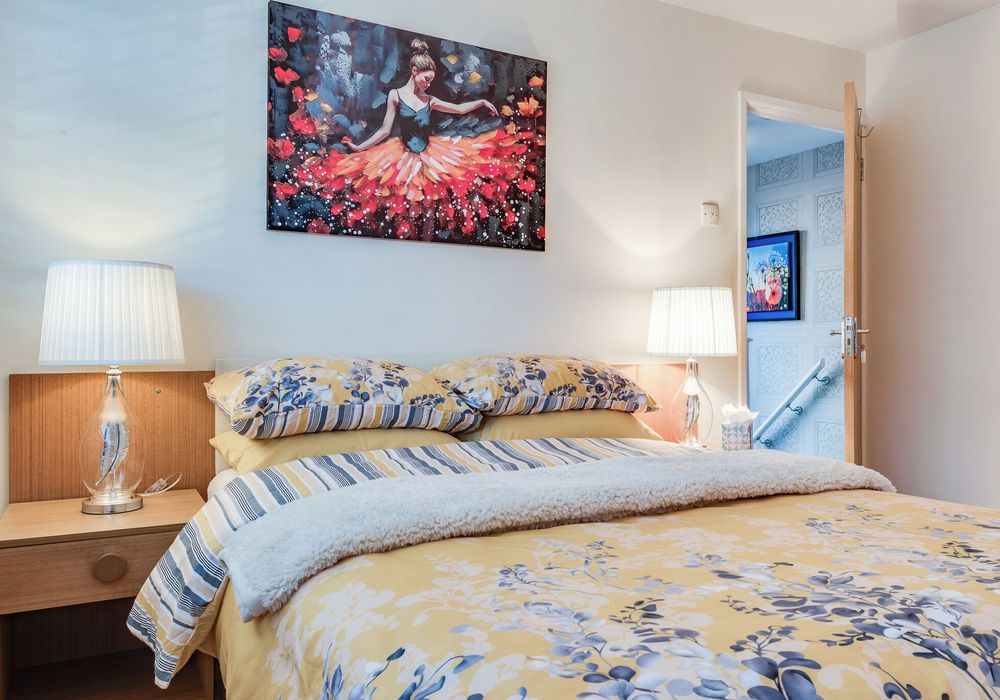 Bright and airy with a double bed, ideal for couples or solo travelers, with ample storage.