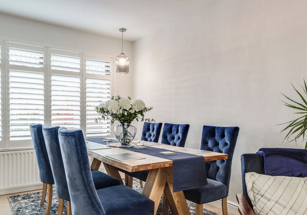 Share meals and make memories with family or friends around a bright, inviting dining table.