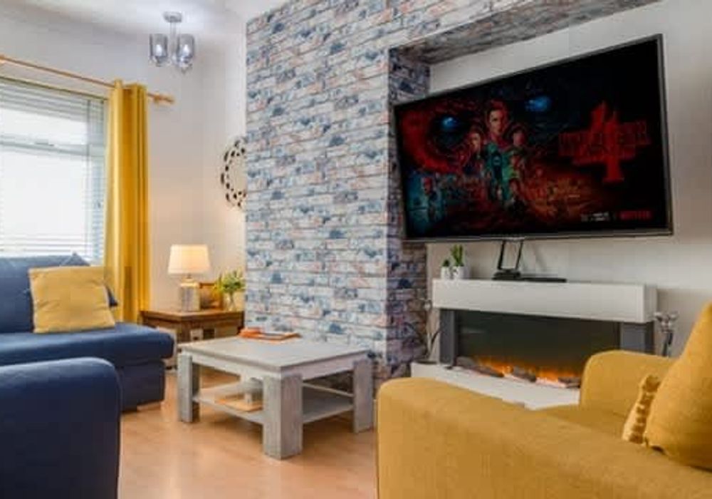 A well appointed, cozy living room for everyone to gather.