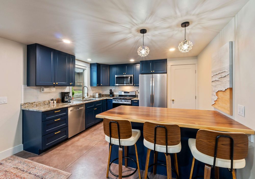 A bright kitchen and dining space designed for shared meals and connection.