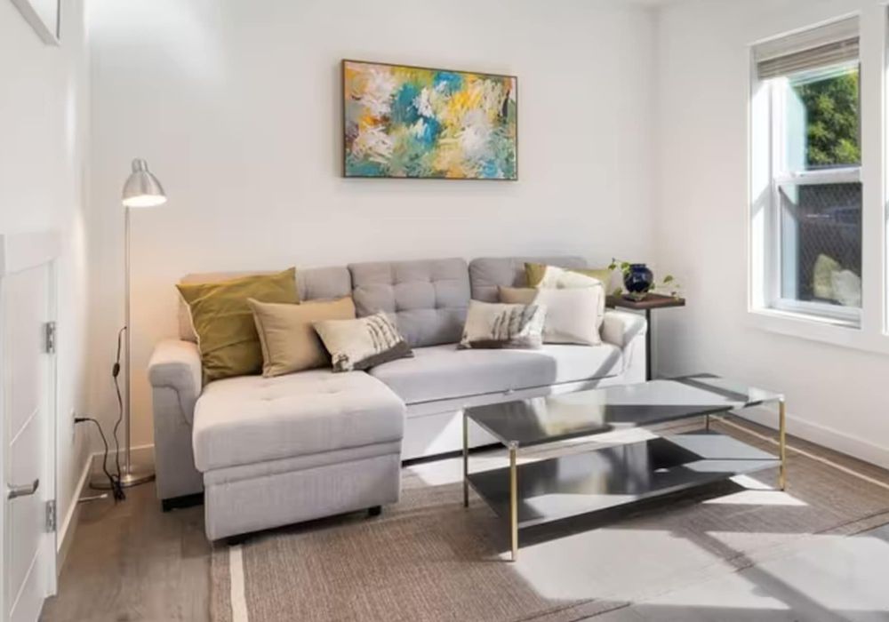 Watch a show or take a nap in this bright space with large windows and comfortable seating.