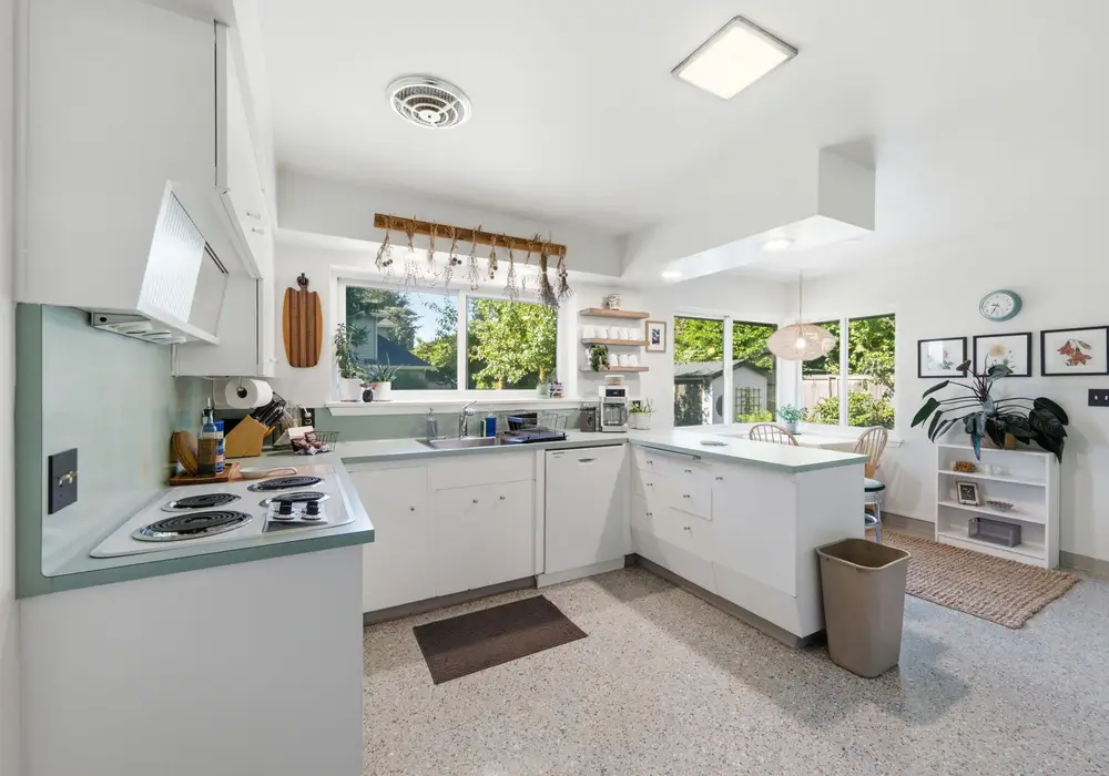Bright kitchen designed for both convenience and comfort.