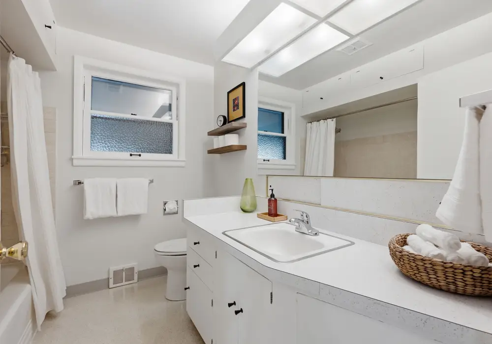 Refresh and recharge in the spacious bathroom.