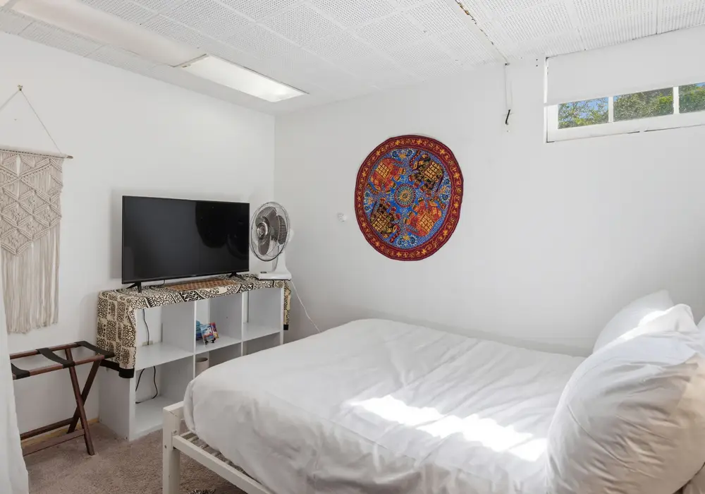 Comfortable sleeping space with plenty of natural light.