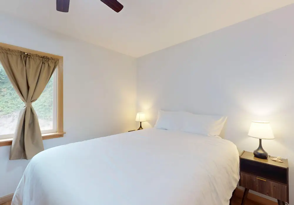 A comfortable queen bedroom designed for restful nights.