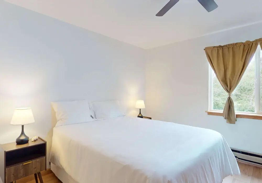 Fresh linens and a comfortable queen bed make winding down easy.