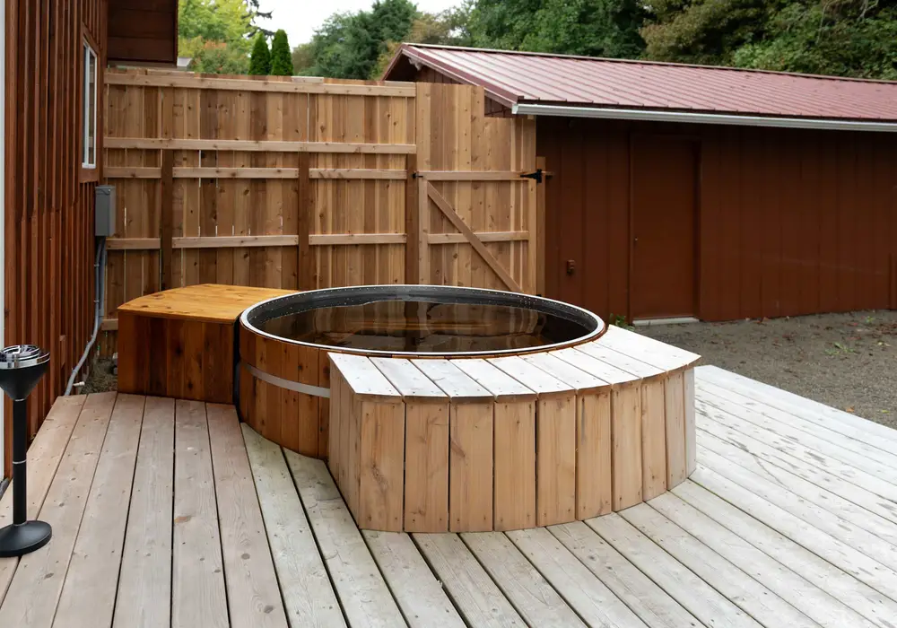 Your private hot tub is ready for relaxing evenings after a day on the coast.
