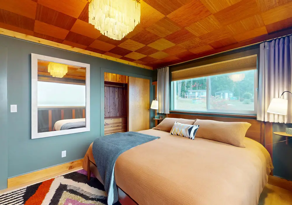 A spacious king bed offers a comfortable place to unwind and recharge.
