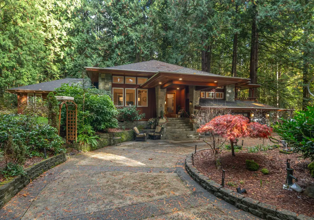 A welcoming entrance surrounded by lush greenery sets the tone for a relaxing stay.