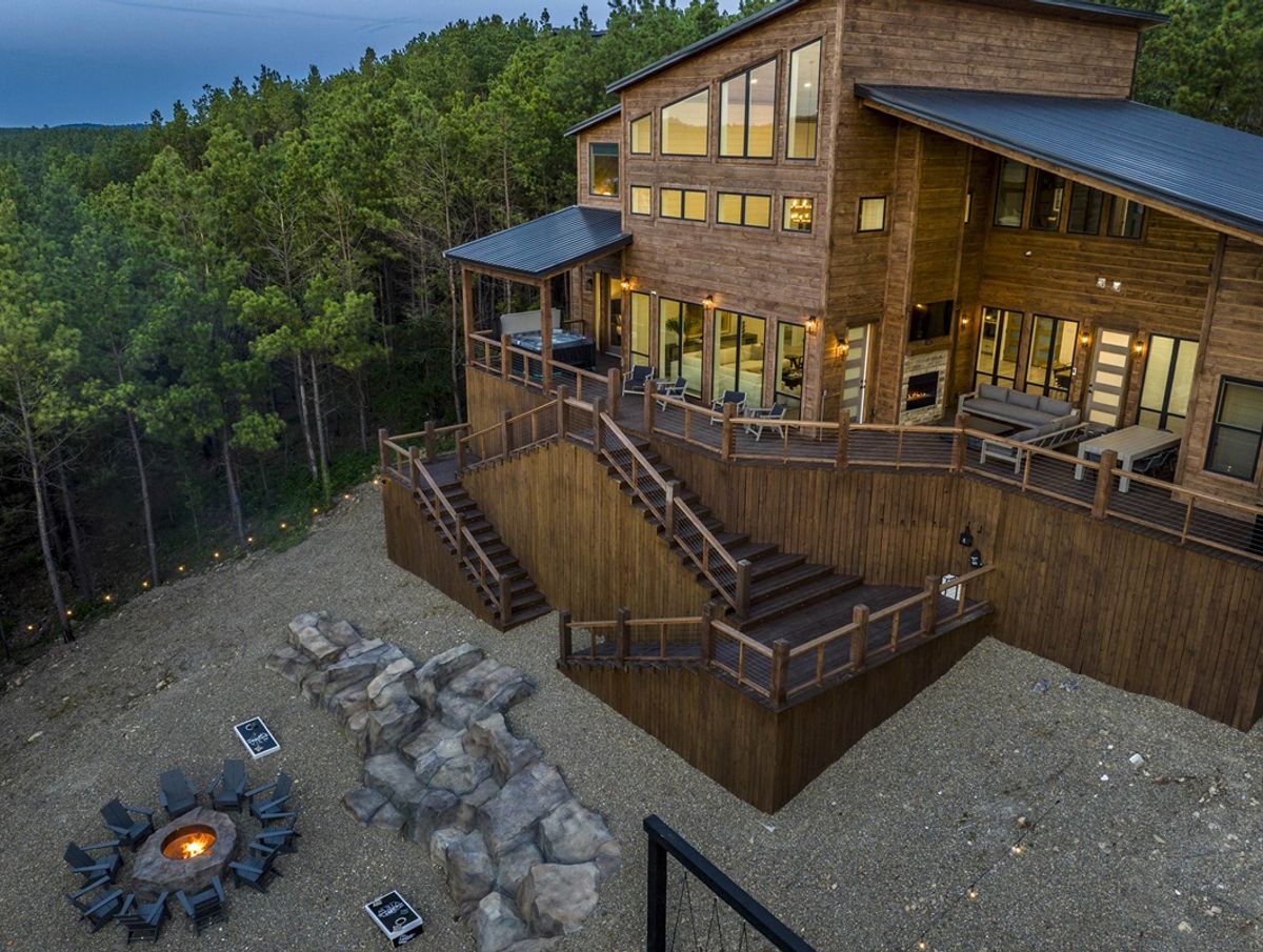 Luxury cabin, A View From The Top, nestled amongst the trees with a spacious deck