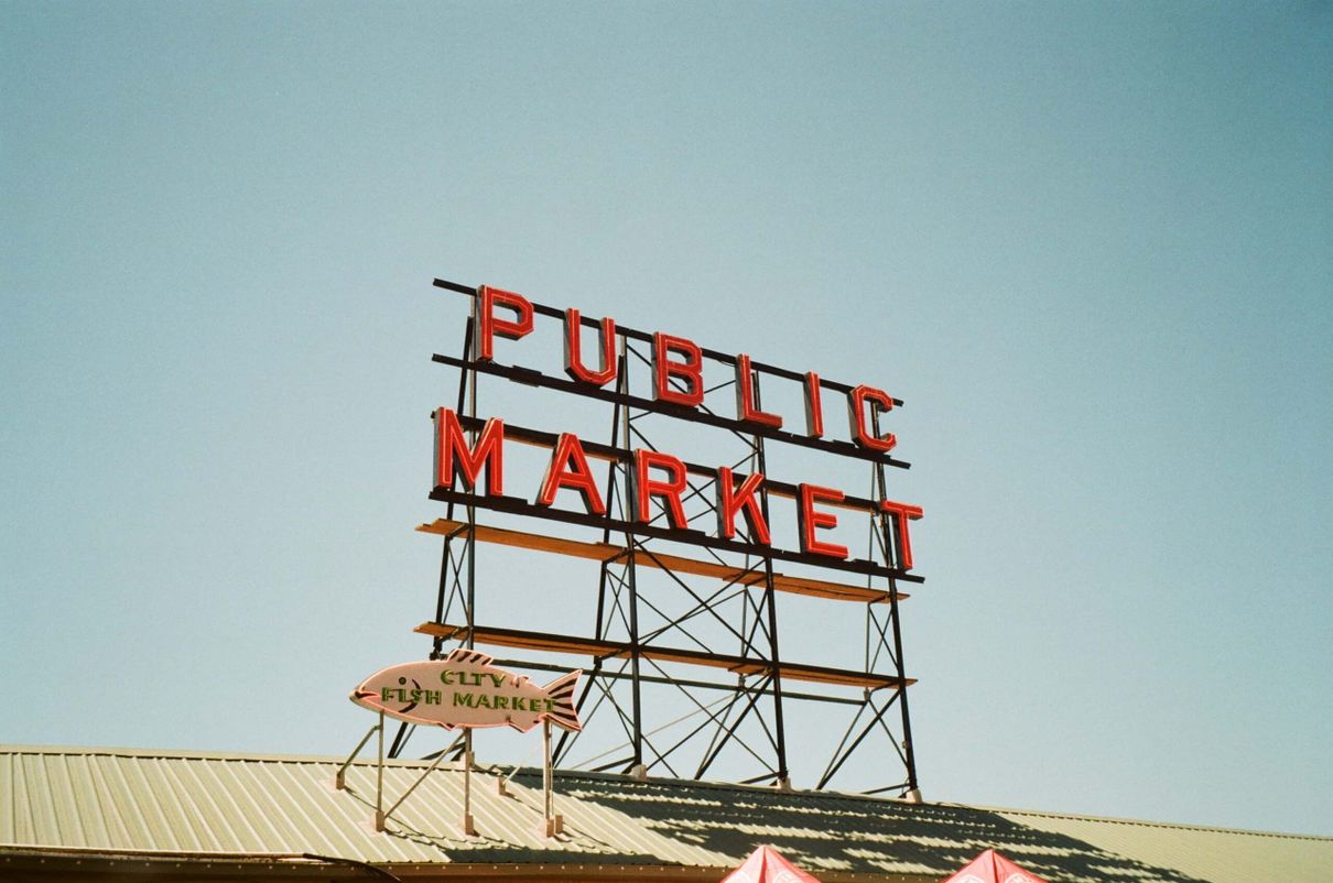 View of Pike Place Market, showcasing summer in Seattle where our Seattle vacation rental management expertise enhances property potential.