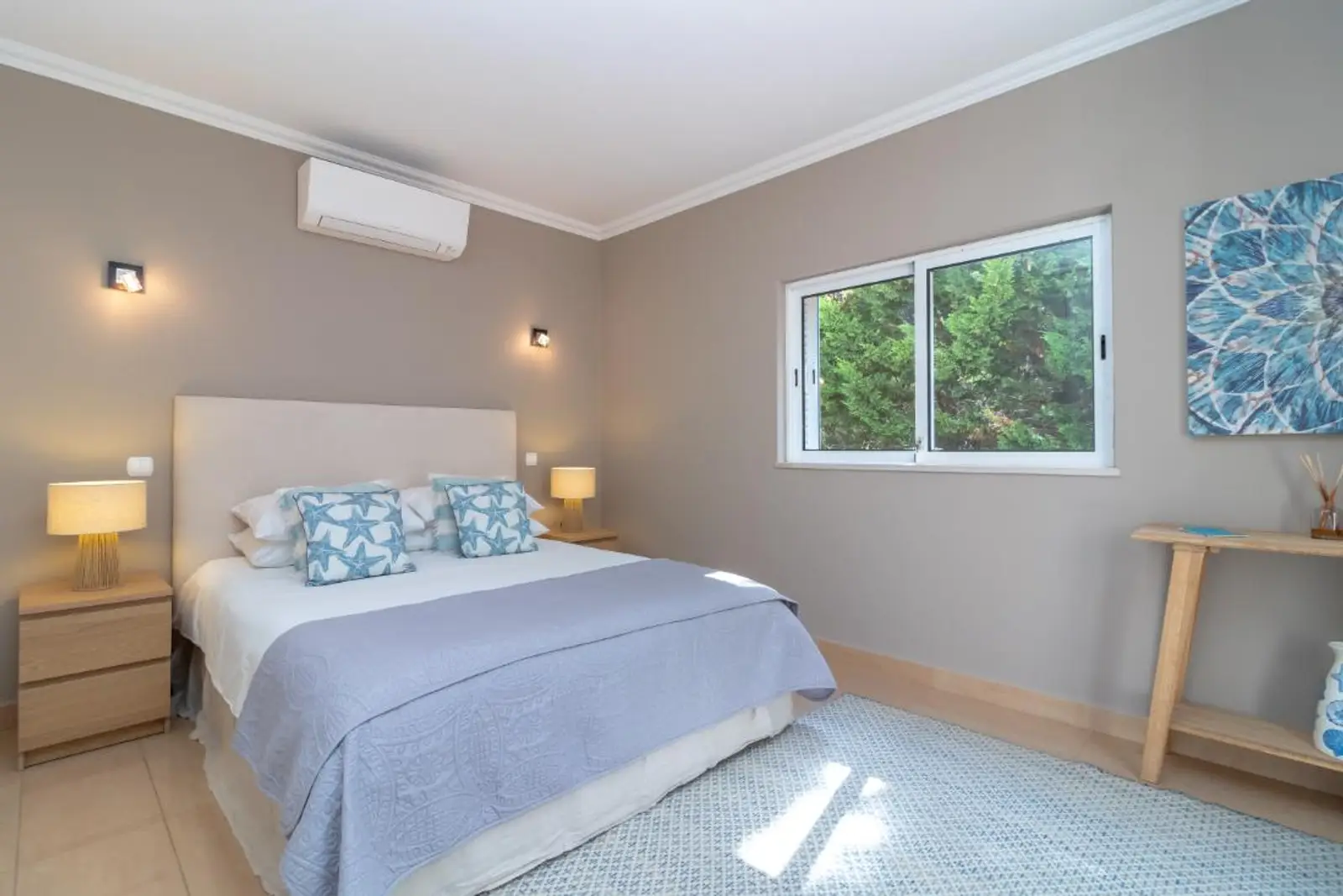 Double bedroom with garden outlook and fitted air conditioning
