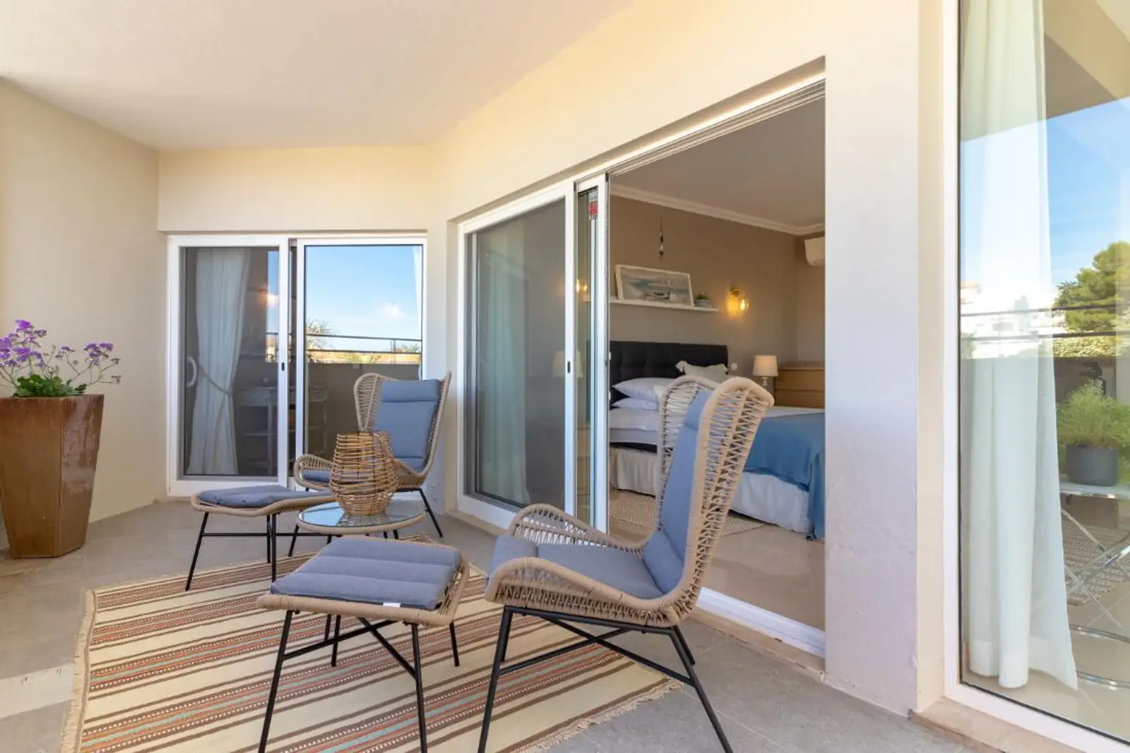 Terrace seating outside the bedroom sliding doors