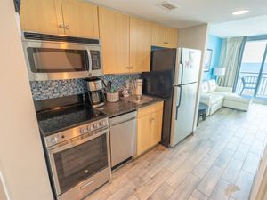 Full Sized Modern Appliances in Kitchen Area