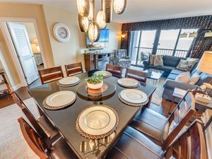 - Spacious dining table, perfect for meals, game nights, or celebrating moments - Open layout create an inviting atmosphere with ocean views in the background - Seamless connection to the living room & balcony makes every meal a scenic experience