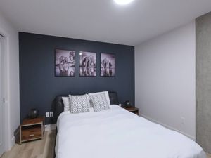 Sleep in Comfort and Style – Plush Bed with Amazing Decor.