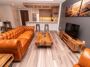 Unwind in Elegance – Spacious Living Area with Stunning Cityscape Views.