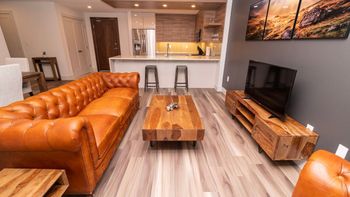 Unwind in Elegance – Spacious Living Area with Stunning Cityscape Views.